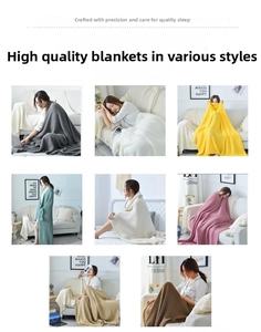 Multiple colors of Nordic knit blankets with waffle texture and decorative tassels