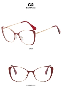 Detailed side and front view of vintage cat-eye red frames with golden metal temples