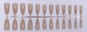 Macro view of 24 pieces nude ballerina press-on nails on a plastic display stand