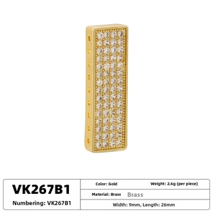 Λεπτομέρεια ορειχάλκινης χάντρας 9x26mm με χρυσή επίστρωση και λευκά ζιργκόν pavé