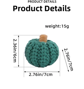 Detailed view of handmade green knitted pumpkin with stem for party decoration