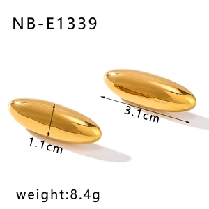 Detailed view of chunky golden teardrop earrings showing 3.1cm length and 1.1cm width size