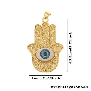 Detailed size chart of golden Hamsa hand pendant with blue evil eye and dimensions