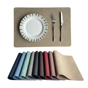 Waterproof faux leather placemat set in ten colors with modern Nordic style table setting