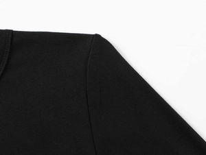 Close-up of neckline ribbing and double-needle stitching on black modal sports t-shirt