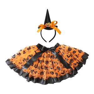 Detail of kids Halloween tutu set with pumpkin patterns and witch hat headband