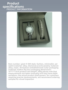 Detailed view of diamond-studded women watch and heart bracelet in grey gift box