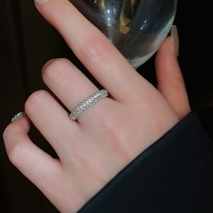 Close-up of a silver twist open ring with double-row micro-pave cubic zirconia