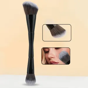 Close-up of double-ended foundation brush with soft gradient bristles and black handle