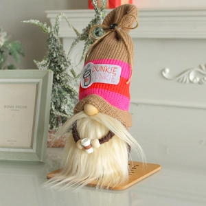 Coffee themed faceless gnome doll with striped knit hat and Dunkie Junkie embroidery
