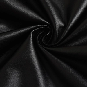 Détail du similicuir noir avec grain fin et finition réfléchissante métallique élégante