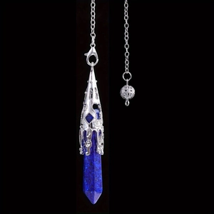 Detailed macro view of the lapis lazuli hexagonal crystal pendant with ornate silver filigree