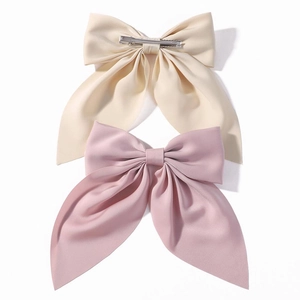 Set of large beige and pink silk bow hair clips with durable metal spring fastener