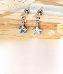 Detail of silver star ear stud with blue cubic zirconia and 0.8x6mm surgical steel post