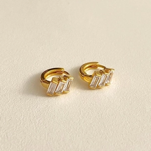 Elegant gold S925 silver hoop earrings with three baguette-cut clear zircon stones