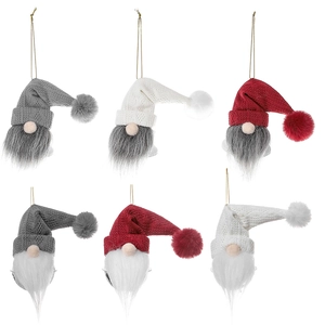 Set of six Nordic Christmas gnome ornaments with colorful knitted hats and iron bells