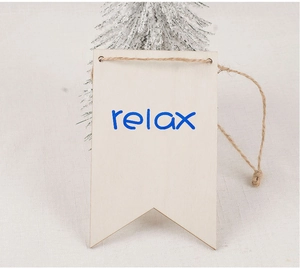 Detail of triangular wooden sign with blue relax lettering and natural hemp rope