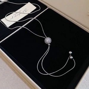 Adjustable sterling silver snake chain necklace with sparkling zircon pavé ball pendant