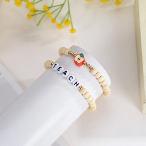 Handmade wooden teacher beaded bracelet set with TEACH letters and red apple charm