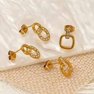 Golden titanium steel stud earrings set with sparkling zircon in geometric shapes