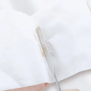 Dual-use makeup spatula cleaning cloth wiping off liquid foundation from metal tool