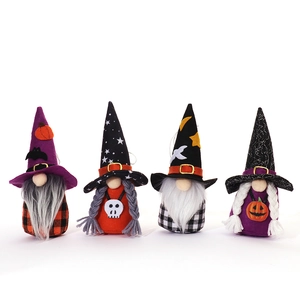 Set of four colorful Halloween gnome plush decorations with pumpkin and bat motifs