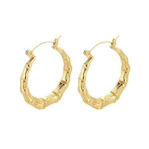 Minimalist U-shaped bamboo joint earrings in polished gold finish for a stylish look