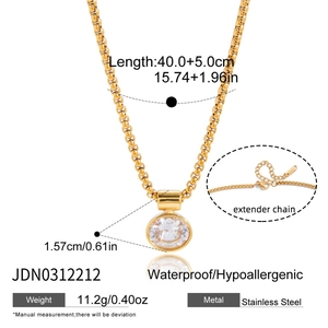 Detail view of gold stainless steel necklace with round crystal and adjustable 5cm chain