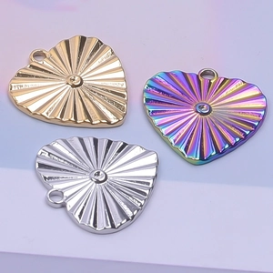 Polished 18k gold and rainbow heart-shaped stainless steel charms with sunburst texture
