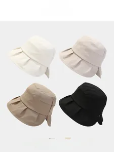 Detailed close-up showing texture and four color options for the women's bow sun hat