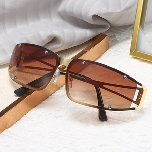 Y2K punk style square frameless sunglasses with gold metal trim and gradient brown lenses