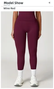 Detailed view of high-waist wine red seamless yoga leggings with elastic compression waistband