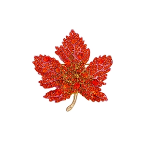 Exquisite gold maple leaf brooch featuring luxury red and orange gradient rhinestones