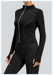 Detail of slim fit yoga jacket with thumb holes and reflective gray contouring lines