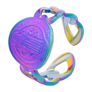 Macro view of adjustable rainbow stainless steel ring featuring a religious saint relief