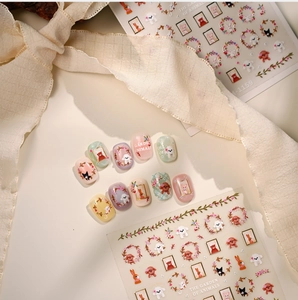 Detail of M-1159 nail art stickers with gold foil cute animals and garden flowers