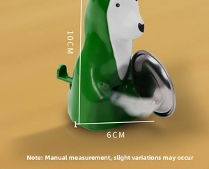 Macro-opname van groene bureauhond met hoogte van 10cm en basisbreedte van 6cm