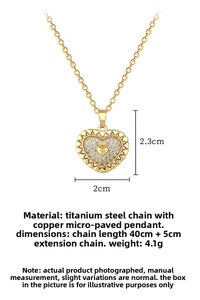 Detailed view of hollow heart necklace with micro-pave crystals and steel chain