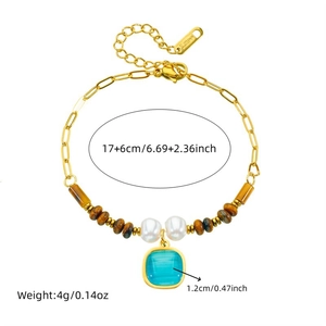 Tiger eye and pearl beaded stainless steel gold bracelet with a blue square pendant