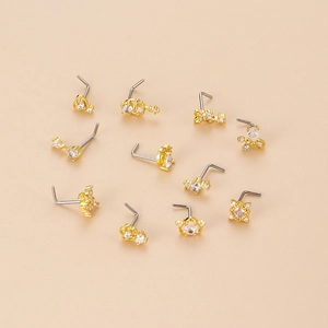 Various L-shaped stainless steel gold nose studs with zircon flowers and star shapes
