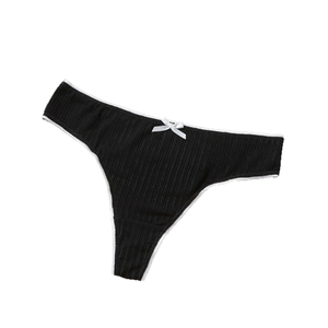 Breathable black ribbed thong for women with a white bow decoration on a white background