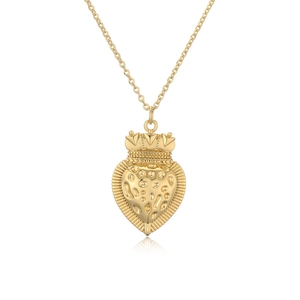Detail of gold heart pendant with crown design and micro-set zircon on delicate chain