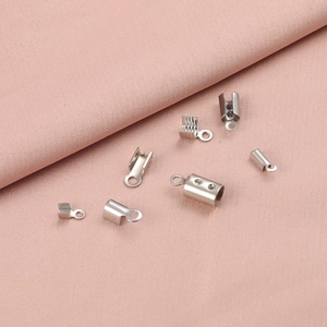 Assorted silver stainless steel end crimps and cord connectors for DIY jewelry making