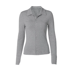 Close-up of gray knitted cotton fabric texture with single-breasted buttons on a cardigan