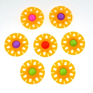 Detailed view of flower shaped fidget toys with colorful silicone bubbles and orange frames