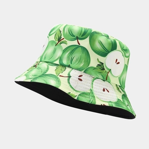 Stylish yellow bucket hat with green apple print and black lining for outdoor sun protection