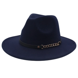 Detail of navy blue wool fedora hat featuring a black leather band and gold metal chain