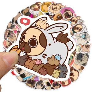 Close-up of waterproof cartoon Pug stickers showing cute dog designs for laptop decor