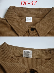 Detail of size L label and fabric composition on brown corduroy shirt collar