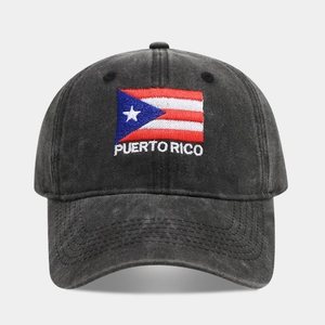 Detailed embroidery of Puerto Rico flag and text on a washed black cotton baseball cap